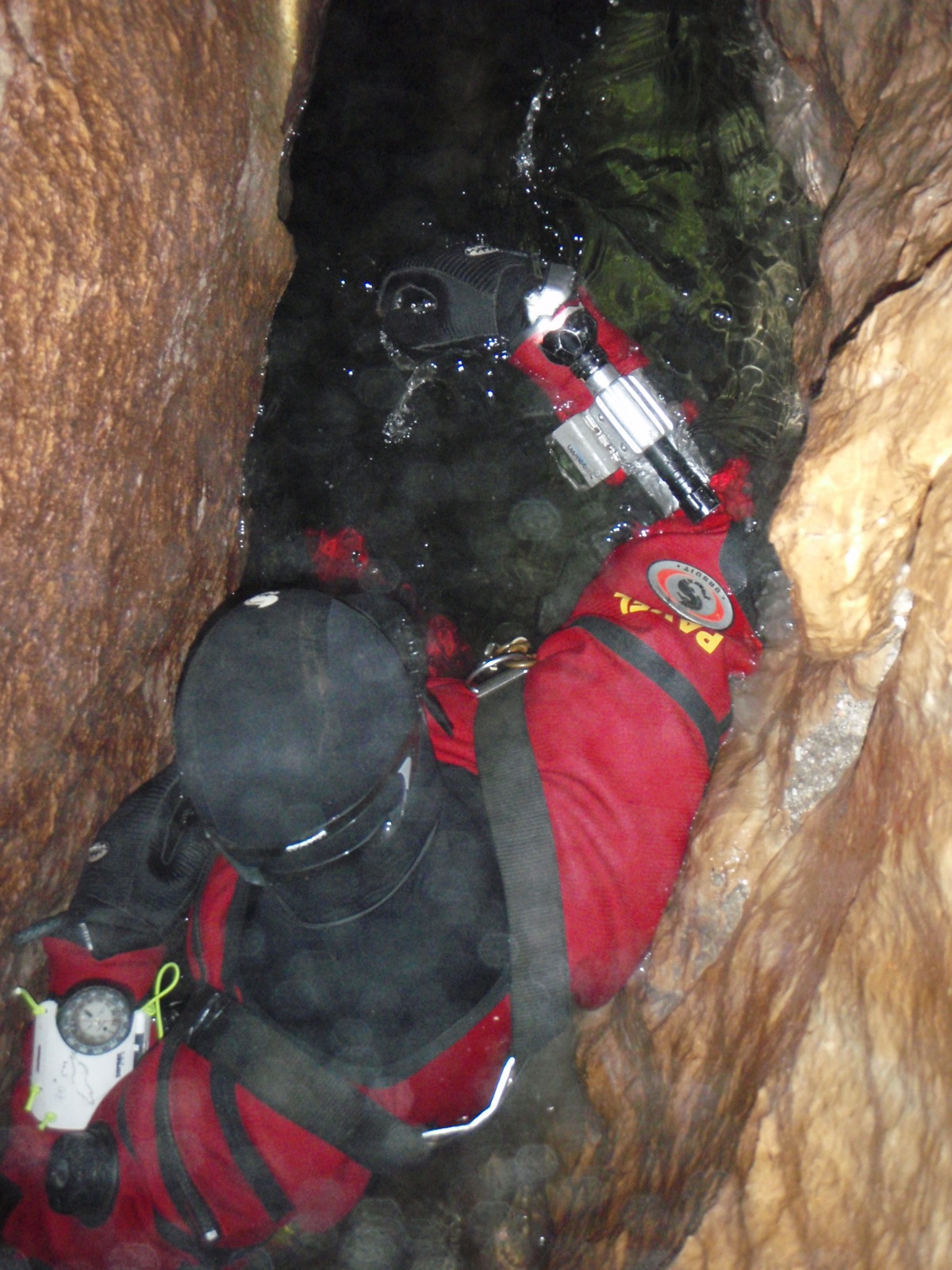 Exploring new siphon in Hirschaulabyrinth 2011, photo by J. Encev